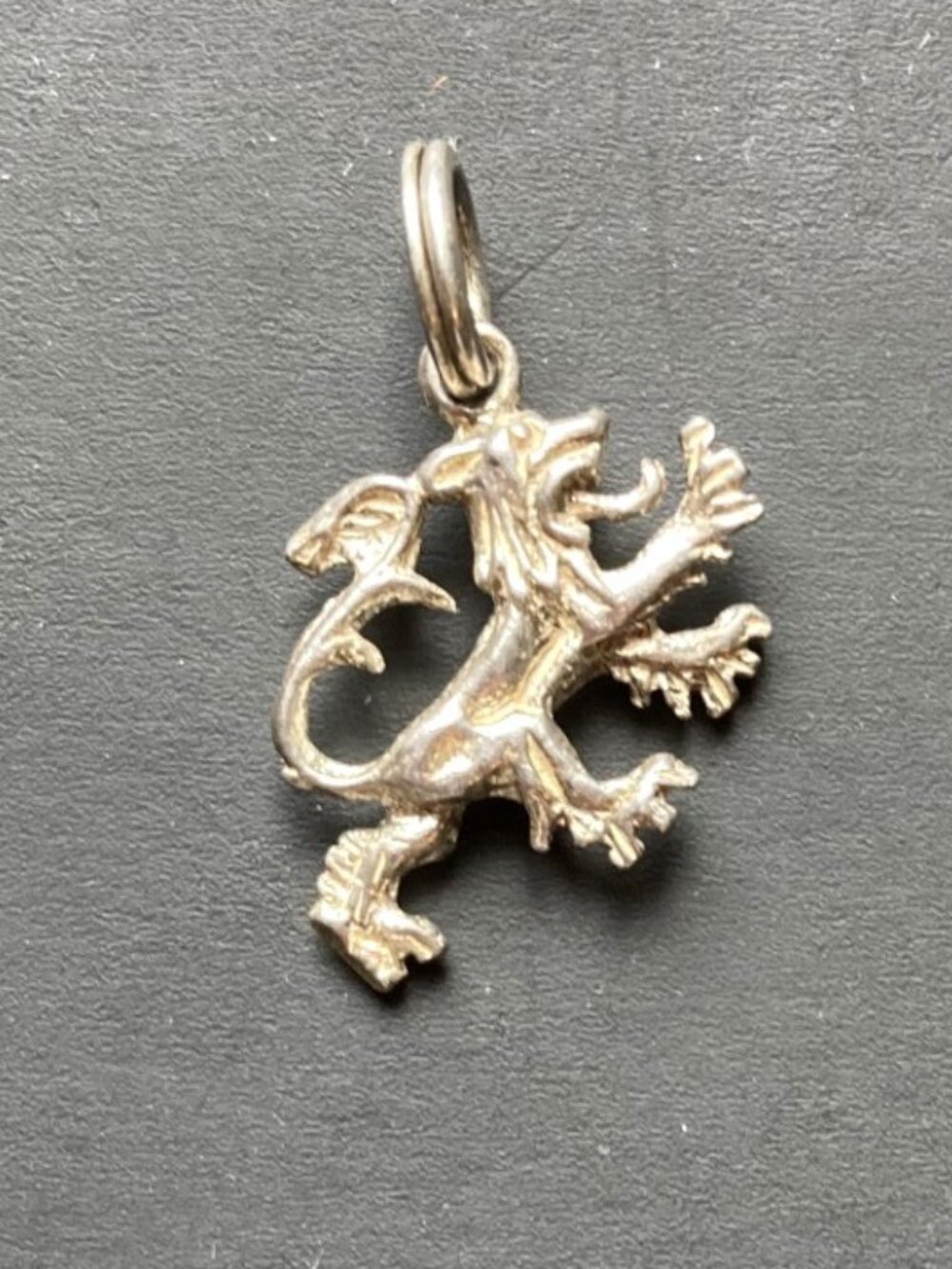 Lion rampant heraldic charm in solid silver